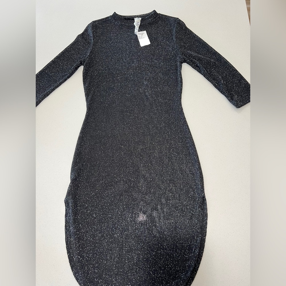 Woman’s black shear Mimi dress with split on both sides